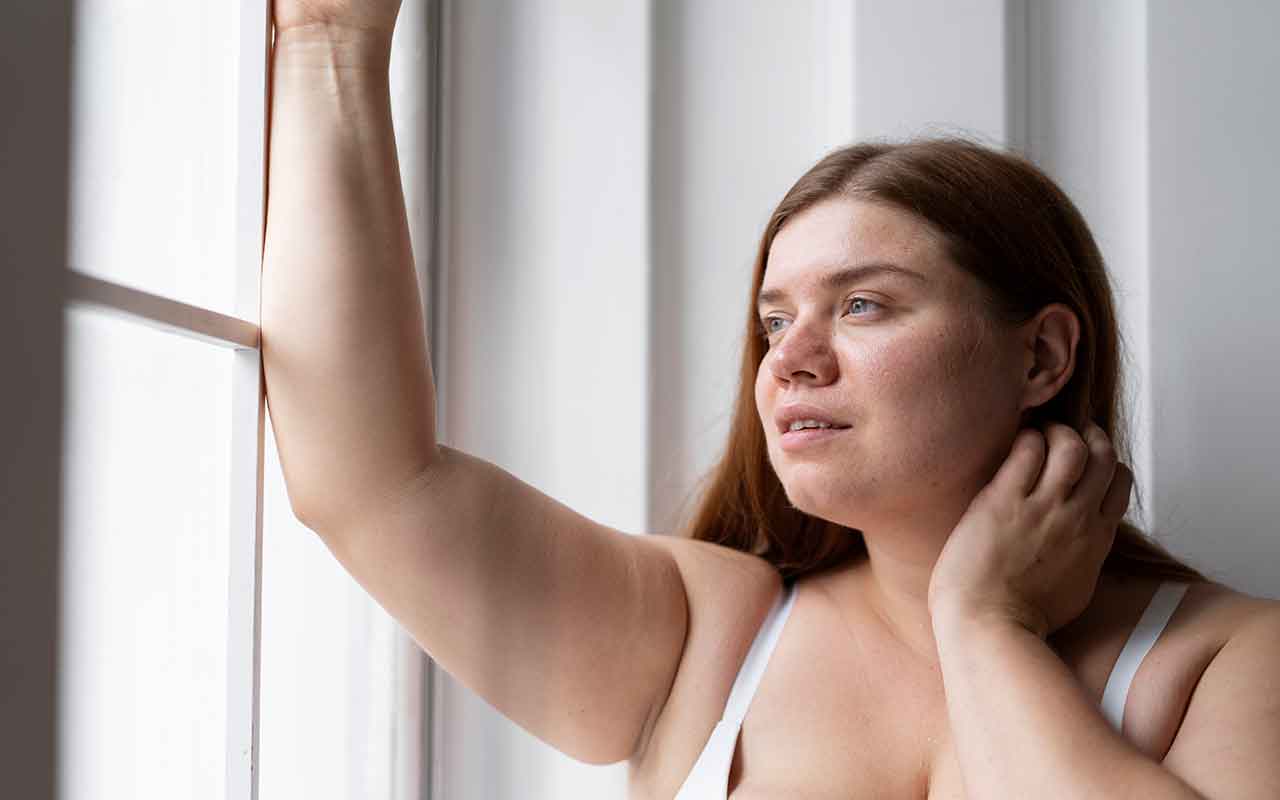 Comprendre les causes du bras qui pendent après une perte de poids